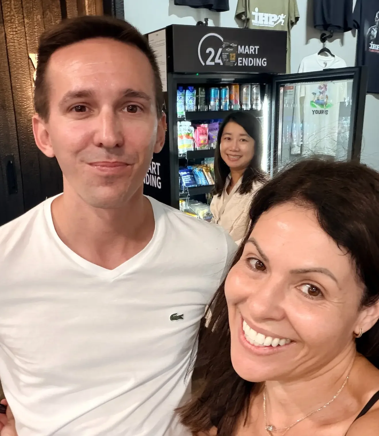 Stockd co-founders Chris Coons and Hannah Zlatkiss at a Stockd machine inside the Institute of Human Performance